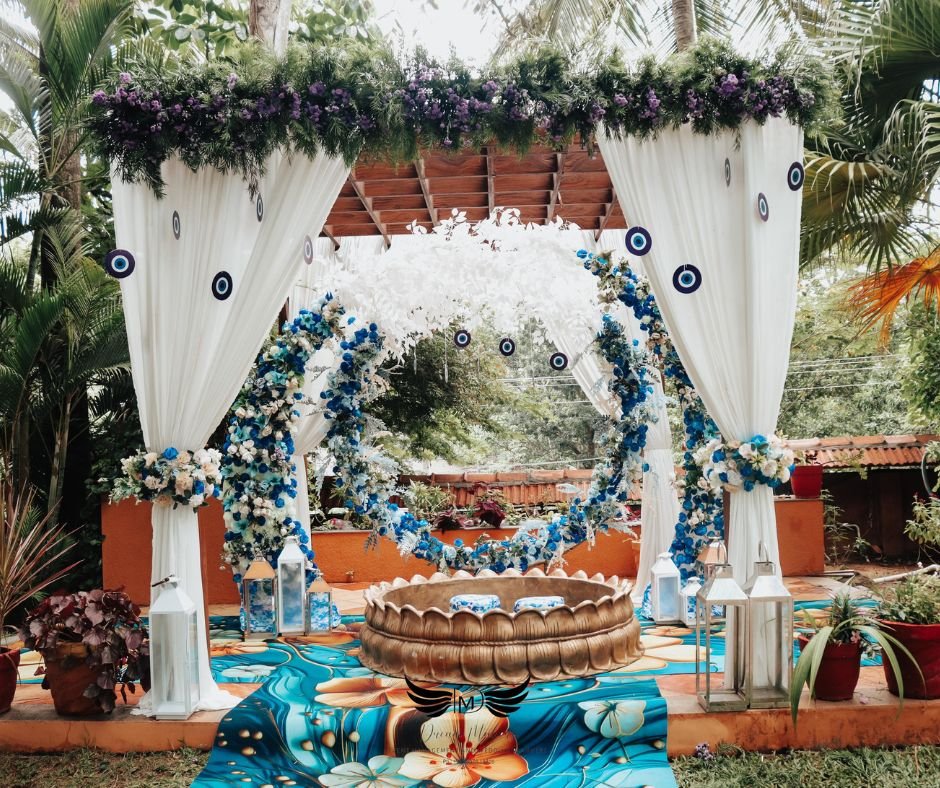 Luxurious stage decoration with floral drapes and LED lighting by an Event Management Company in Kollam